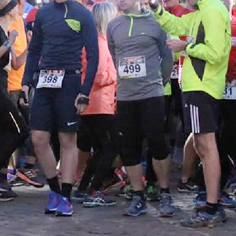 Gre son dossard avant la comptition running